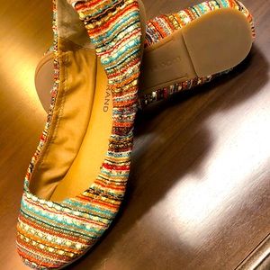 Lucky Brand multi color slip on shoes.